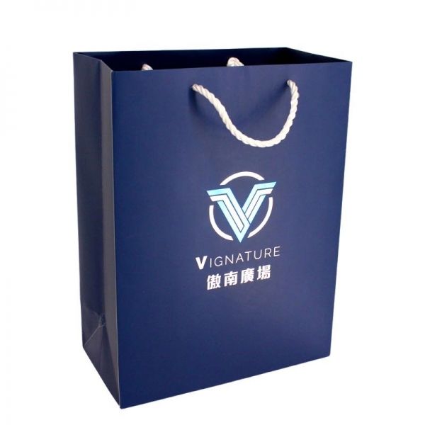 Promotional paper bag with PP string handles