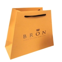 Trapezoid shopping bag with matt lamination embossed logo and PP string handles