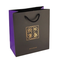 XO sauce paper packaging bag with  shiny gold hot stamping logo and and black cotton cord handles
