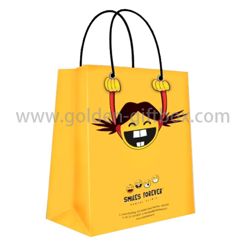 Yellow shopping bag with funny pattern design and 2 handles